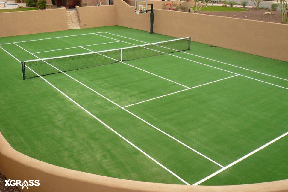 Synthetic grass tennis court installed in the backyard