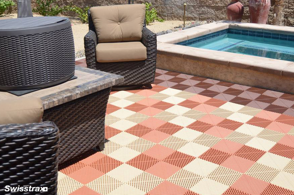 Backyard patio installed with Swisstrax's interlocking floor tiles
