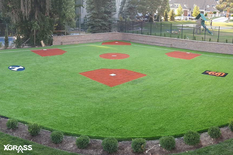 Large backyard baseball field with logos