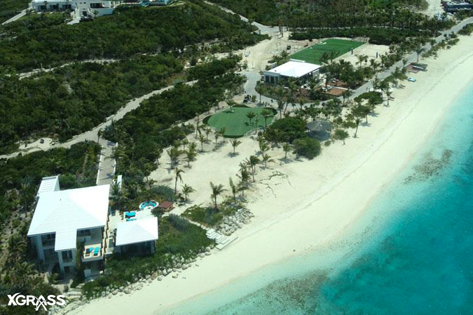 Private beach backyard with a 9 hole golf course and tennis court