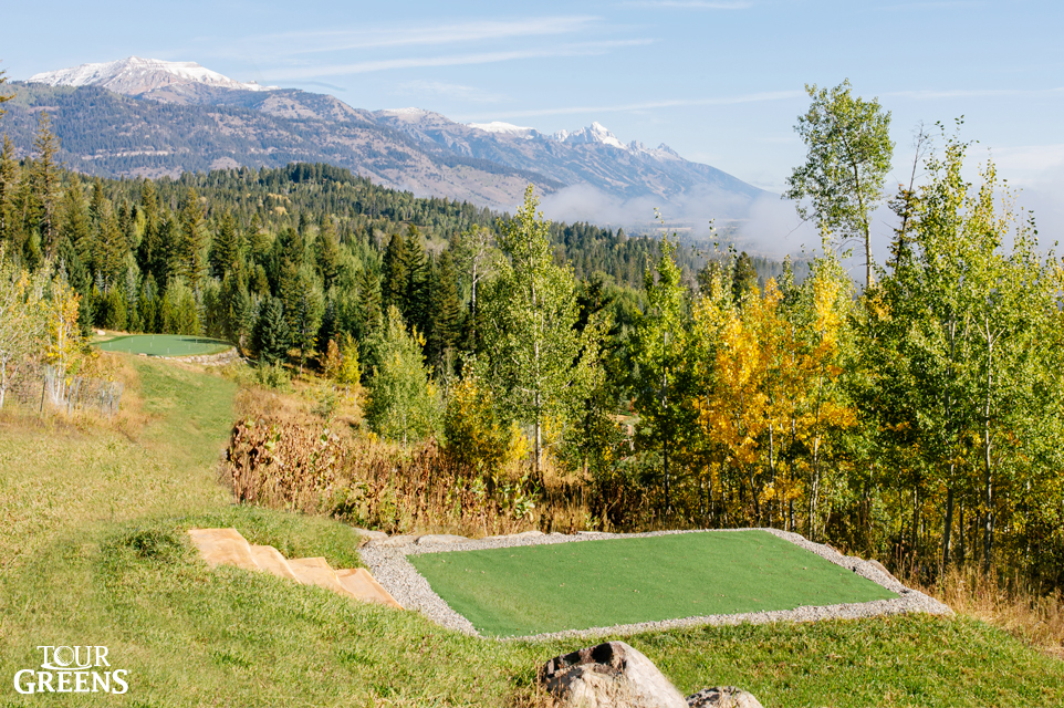 Backyard golf greens installed on the side of a mountain