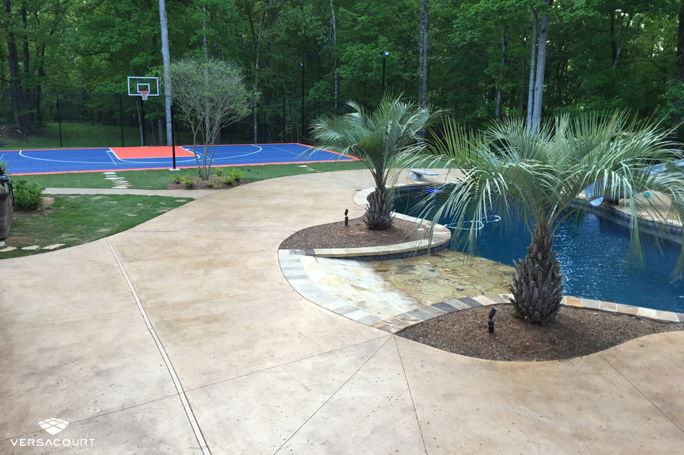 Backyard installed with VersaCourt's multi-sport game court