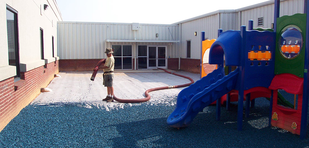 rubber nugget installation on playground
