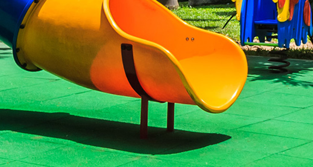 green rubber playground tiles