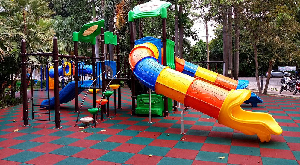 checkerboard playground surface with rubber tiles