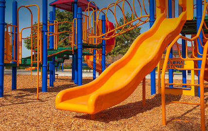Playground installed with engineered wood fiber mulch