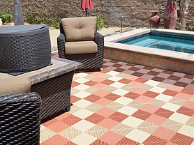 Swisstrax's Ribtrax tiles installed next to backyard pool