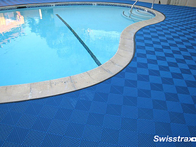 Swisstrax interlocking flooring tiles around swimming pool